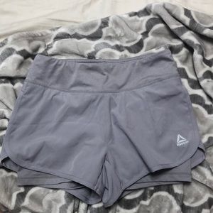 grey reebok athletic shorts
